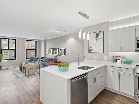 Newly renovated with quartz countertops and stainless steel applainces.