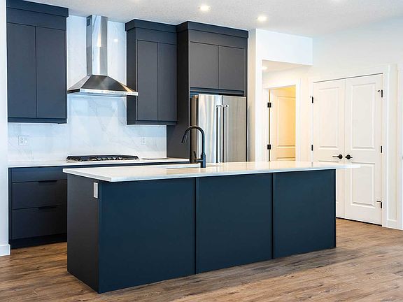A photo of the kitchen of the Hyde model in Crown Park by Brookfield Residential