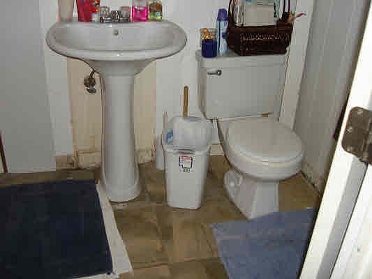 Bathroom with new ceramic tile flooring
