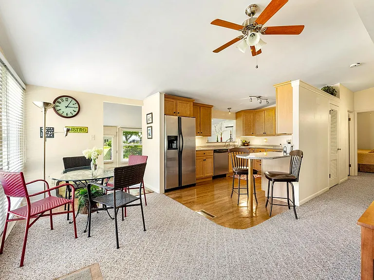 Kitchen and dining areas, showing breakfast bar