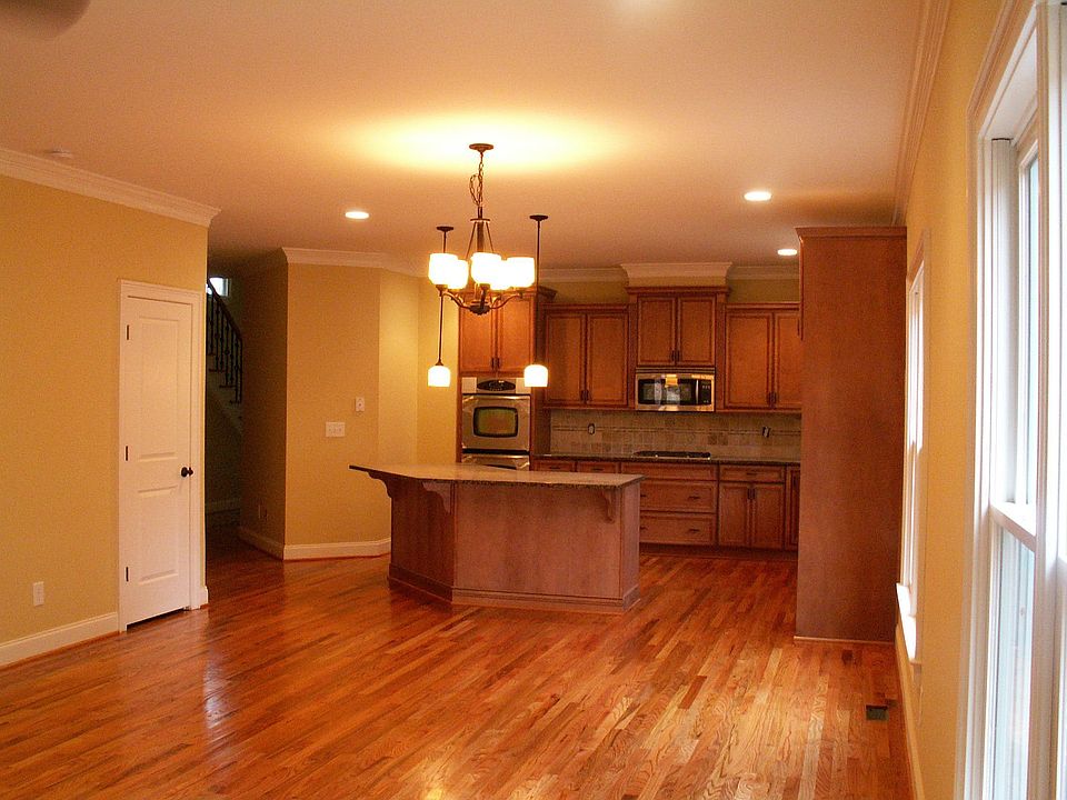 Huge Gourmet Kitchen with Stainless appliances & tumbled marble backsplash