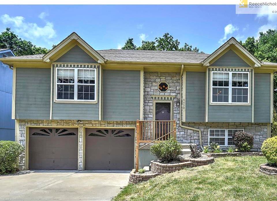 Beautiful split entry with stone accents!