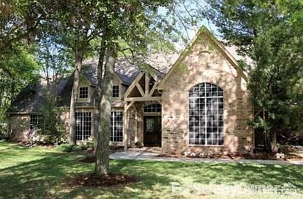 Street view
						:
						This huge custom home is located on 1.21 acres in the prestigious Timbergreen