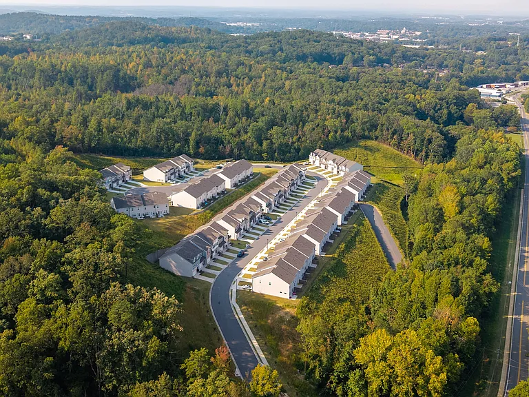 Elevated perspective highlighting the community's design and surroundings.