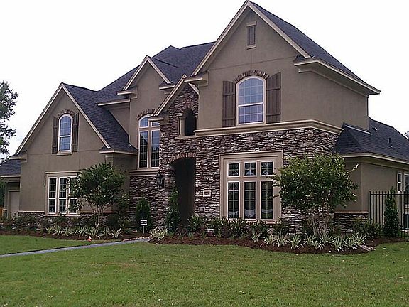 Classic Stucco / Stone Exterior with great attention given to architectural details.