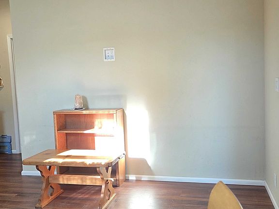 Living room area with space for a couch and or comfy chairs. Either yours or ours depending on if you choose furnished or unfurnished.
