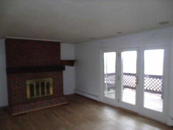 fireplace with living room view