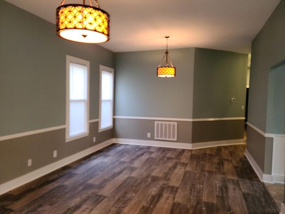 spacious living/dining area with contemporary styling.