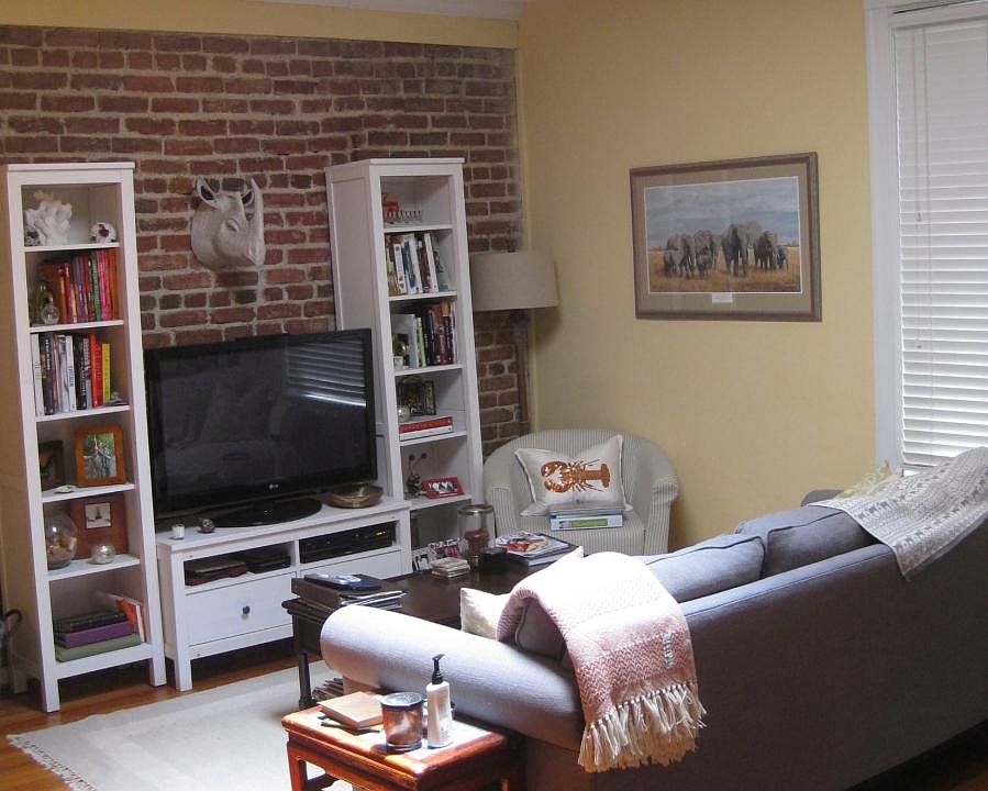 Living Room with exposed brick