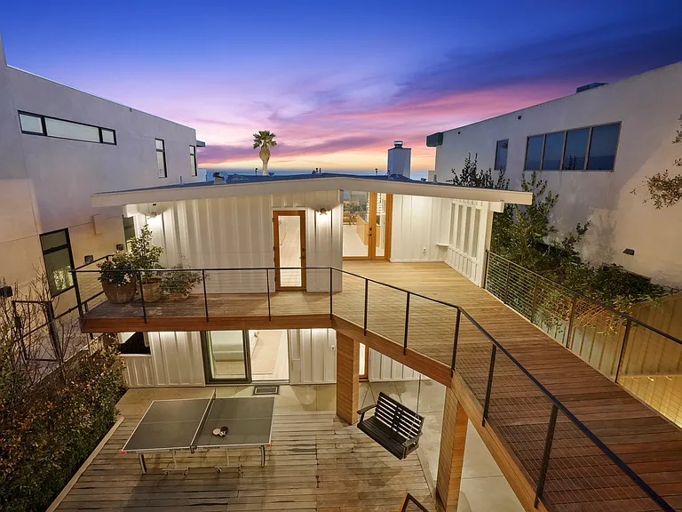 Elevated walkways, open-air design, and a seamless indoor-outdoor flow.