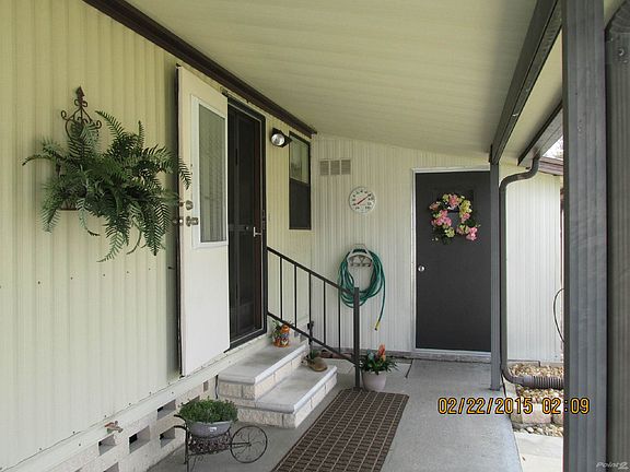 SHED, ENTRANCE TO HOME