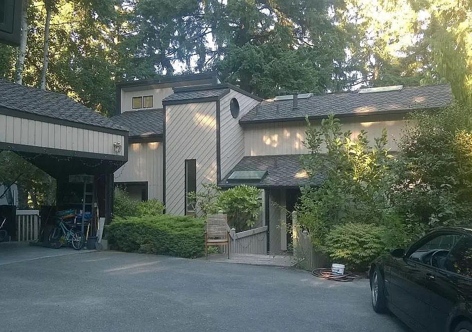 Front of house with carport
