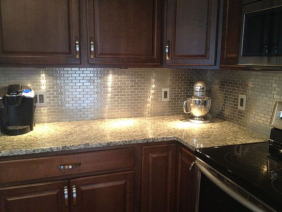 New granite and backsplash