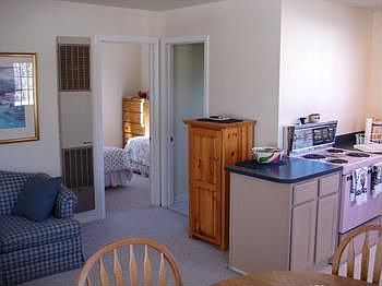 A partial view of the living room opposite the dining area