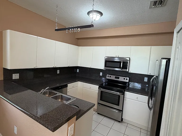 130 Jacaranda Country Club Dr #207 — Photo 5