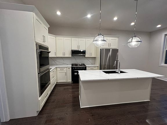5th image of 4819 Main St #204
