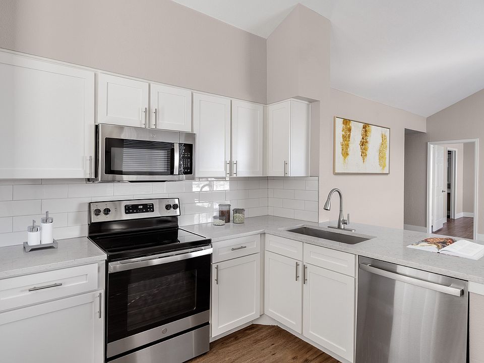 Kitchen with stainless-steel appliances at The Links at Plum Creek in Castle Rock, CO