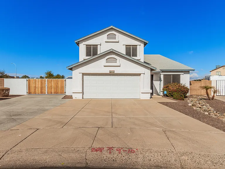 6636 N 90th Dr — Photo 1