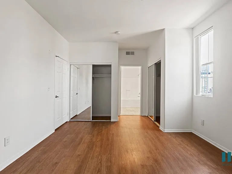 Bedroom with Bathroom and Double Closets