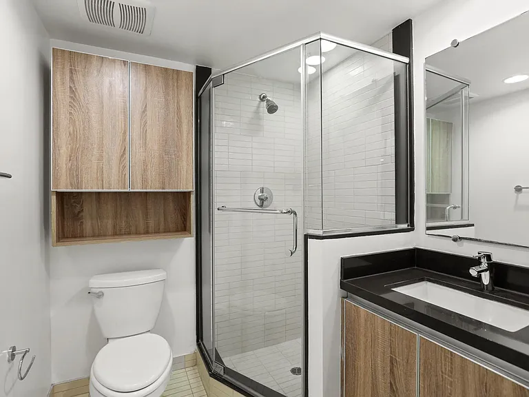 Bathroom with Stand-Up Shower and Vanity Cabinet Storage