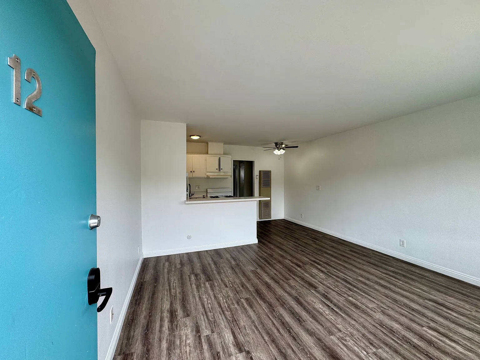 All photos are actual photographs of a comparable unit with a similar floor plan and finish style, shown for reference only.