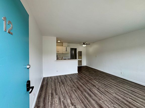 All photos are actual photographs of a comparable unit with a similar floor plan and finish style, shown for reference only.