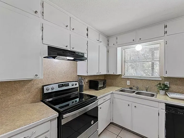 5720 Wharton Dr — Photo 3