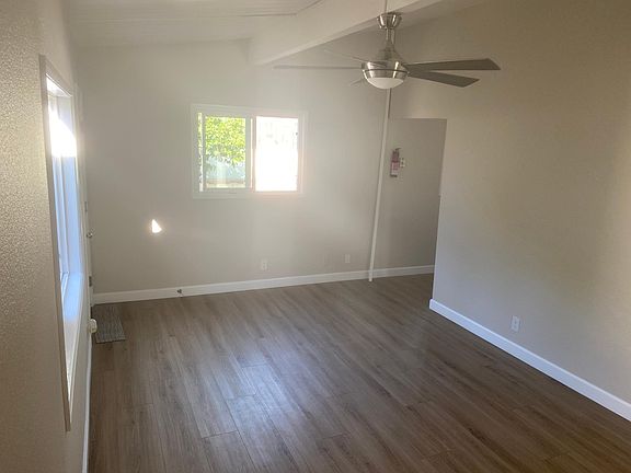 Family Room with brand new ceiling fan