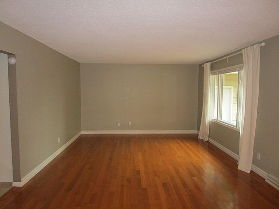 Living room, bright, hardwood flooring