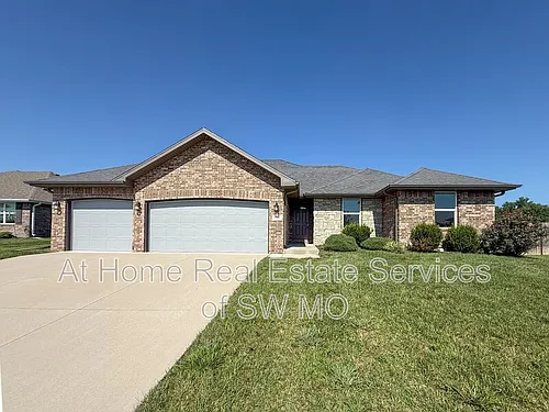 5943 S Iris Ln Photo 1
