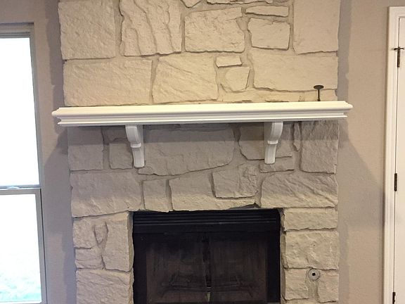 Wood burning Fireplace with Mantle