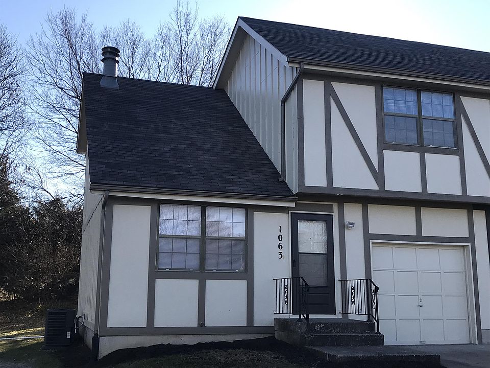 Front of the duplex. Single car garage with opener.