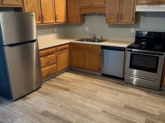 Kitchen with new applicances and LVP flooring