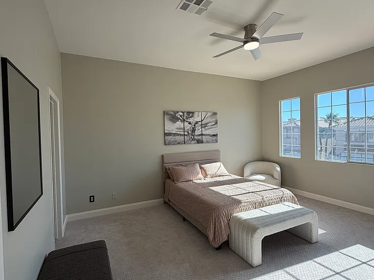 Alternate view of the same large bedroom, taken from the hallway entrance