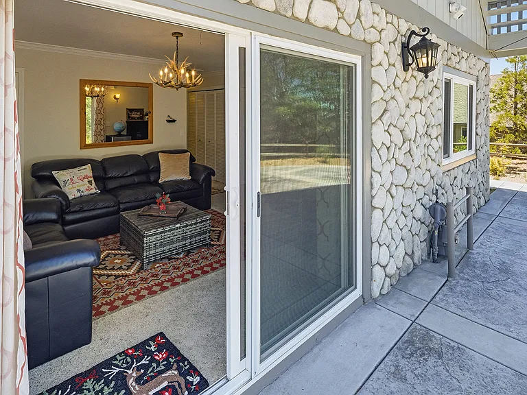 First floor family room with sliding doors to front