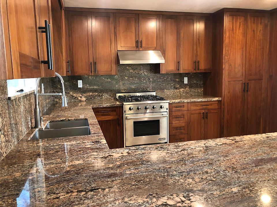 kitchen with gas stove, granite counter tops