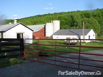Milking parlor, barn and tractor shed