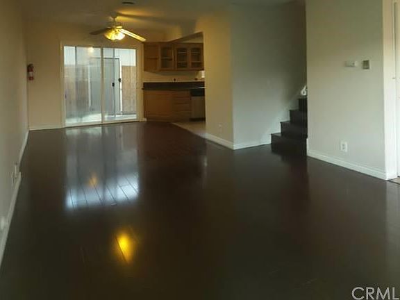 Spacious living area with family room, dining room and kitch