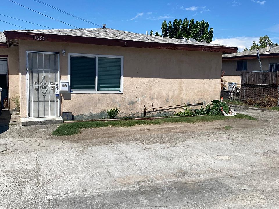 Front view. New asphalt driveway, exterior paint and roofs is in the process to be renovated.