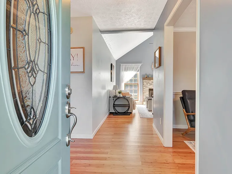 From front door. To the left is the master suite, to the right is the reading room. Straight ahead is living room