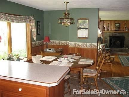 Living room view
						:
						Note the openness of the living room, dining area, and into the kitchen.