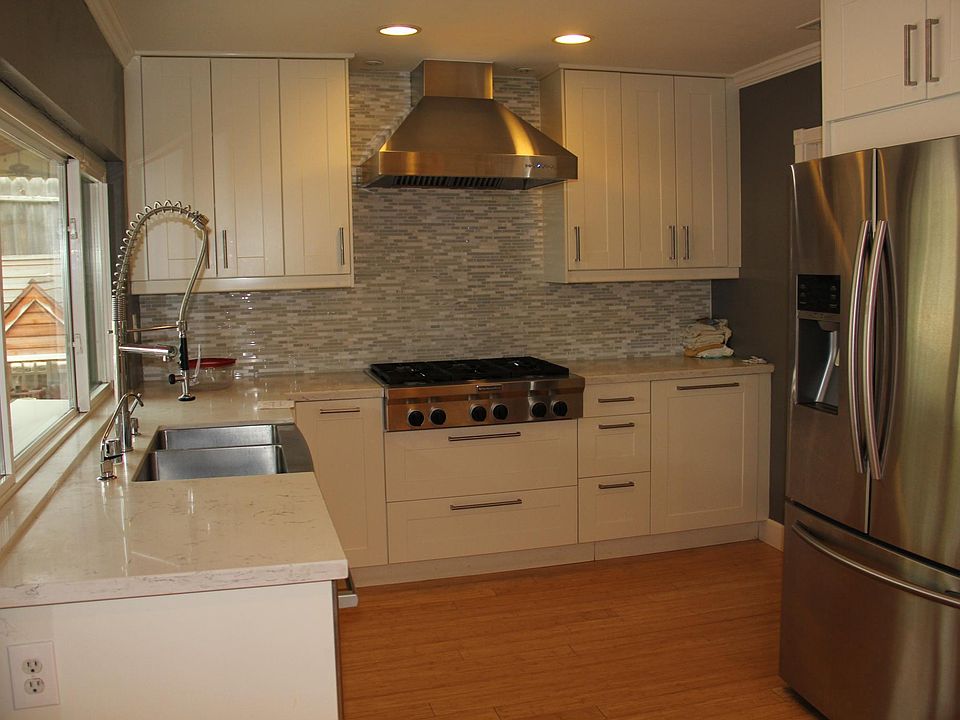 Kitchen with quartz countertops, ss appliances