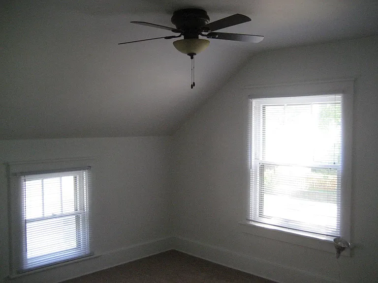 Master bedroom with circulation fan.