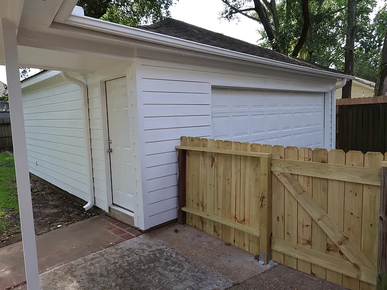 Garage and driveway fence.
