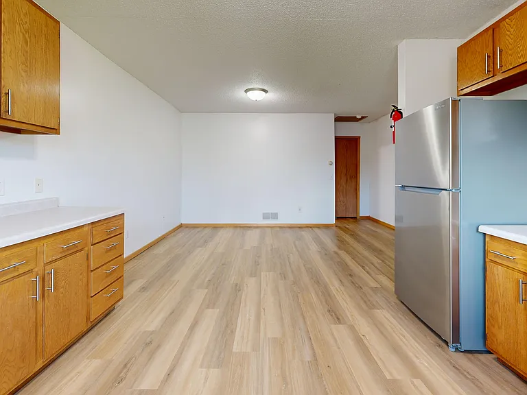 Kitchen with all stainless steel appliances
*Not shown in photo: new base cabinets and countertop in progress