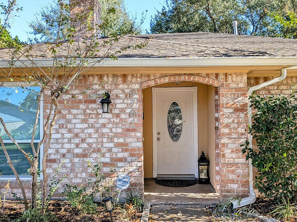 Charming single-story home on a quiet cul-de-sac lot with well-maintained landscaping, double-pane windows, and a covered entryway.