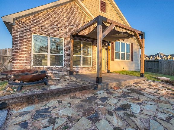 Stone patio is the perfect spot for your outdoor furniture.