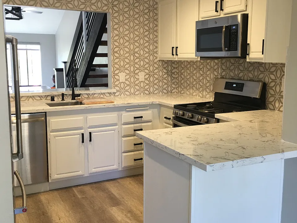 Eat-in kitchen, view 2 - shows view to dining room and living room