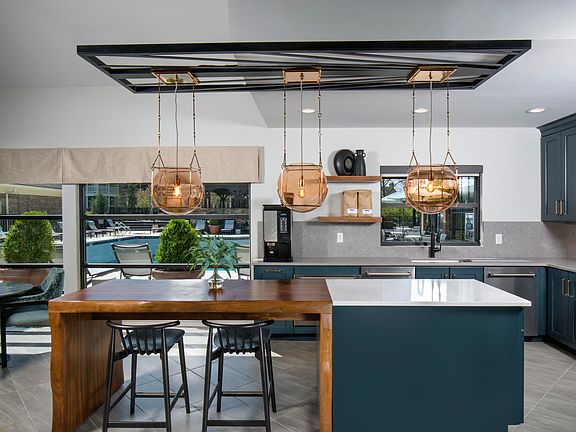 Resident lounge with community kitchen and gourmet coffee bar