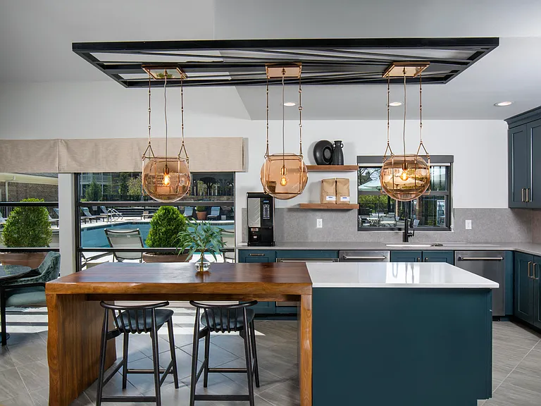 Resident lounge with community kitchen and gourmet coffee bar